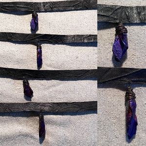 Leather chokers with iridescent titanium coated quartz pieces.
